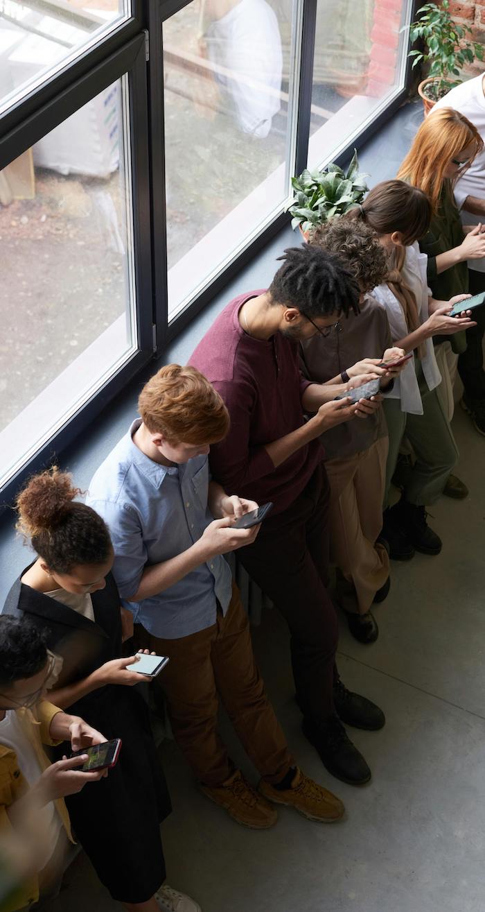 care concepts therapy young adults on phones-min young adults on phones