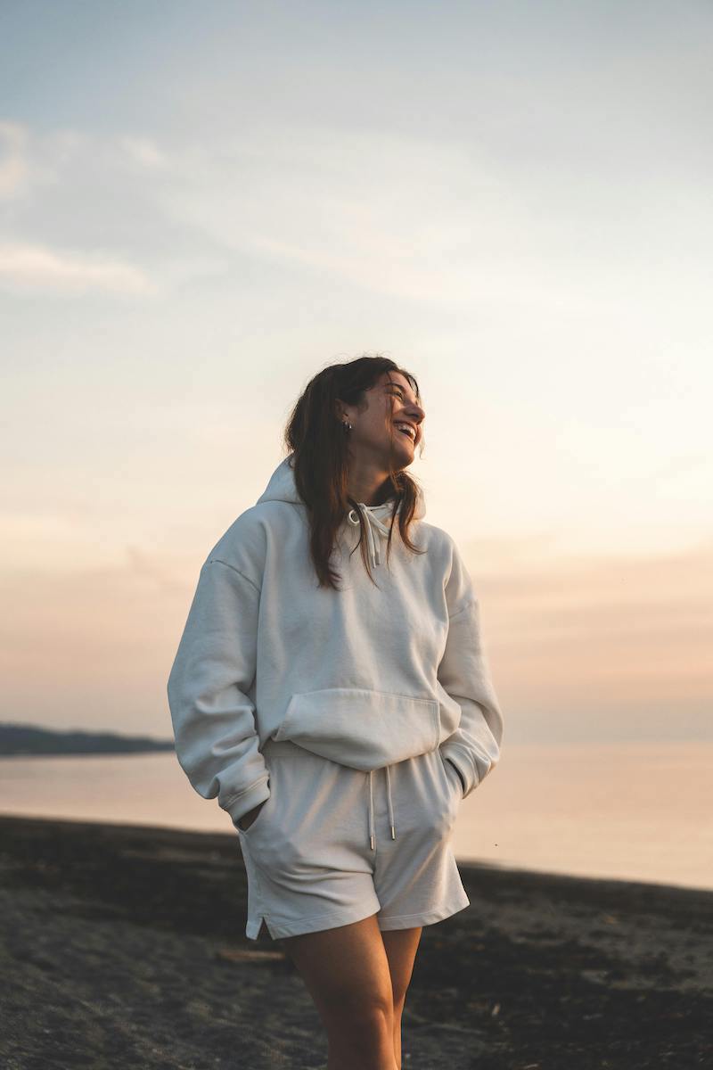 care concepts therapy young woman smiling at the beach-min young woman smiling at the beach