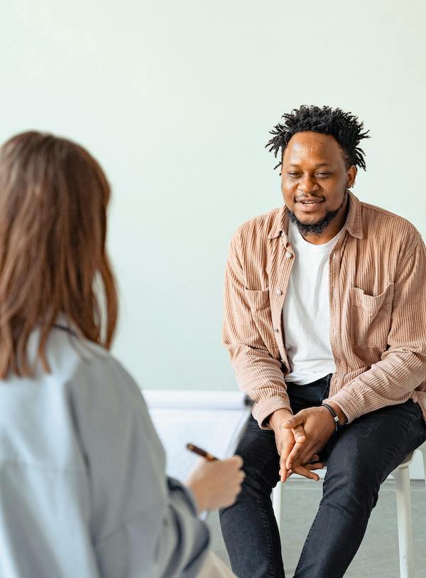 care concepts therapy man in therapy session-min man in therapy session
