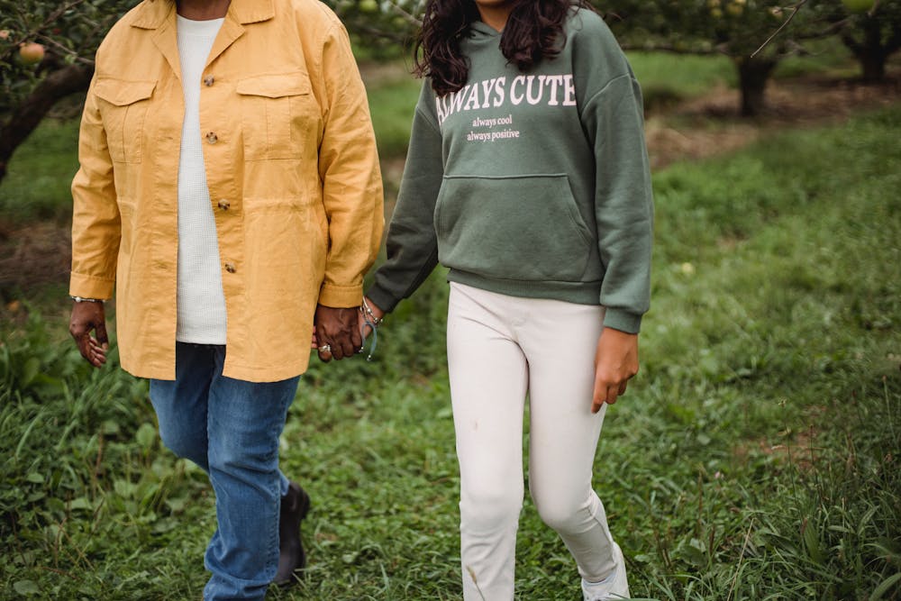 care concepts therapy parents walking and holding hands with a teen-min