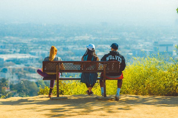 care concepts therapy young adults sitting on bench care concepts therapy young adults sitting on bench